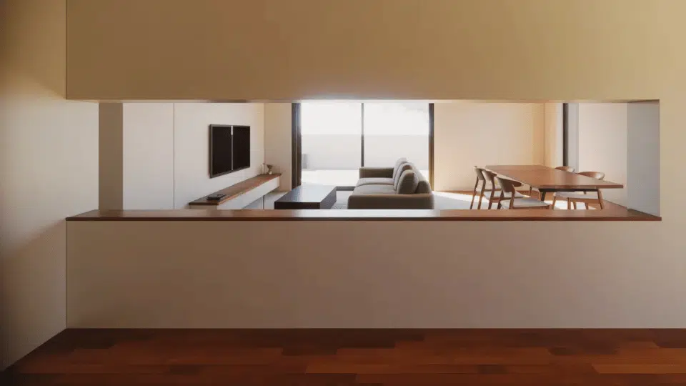 low half wall separates living area from dining space while keeping room bright and open.