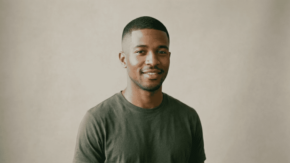 mens fade haircut blending from longer hair on top to skin on sides sharp contrast style