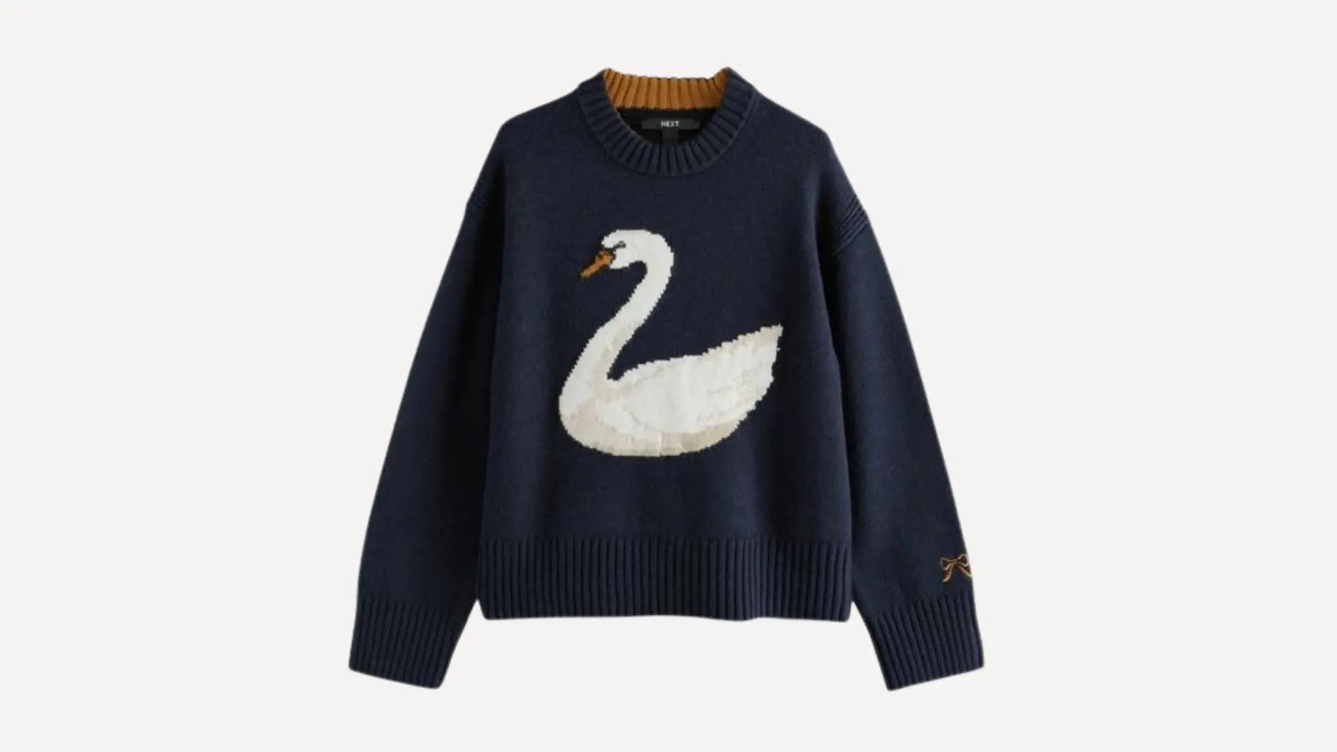 navy blue long-sleeved sweater _ pullover top with a white swan graphic and ribbed neck on a plain white background