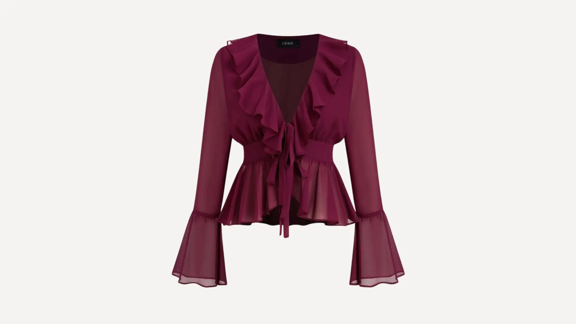 plum-colored ruffle top with long bell sleeves, a deep v-neckline, and a tie-front closure on a plain white background