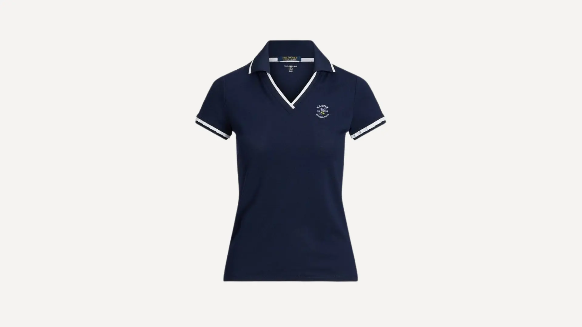 white polo top with short sleeves and a classic button-down collar on a plain background