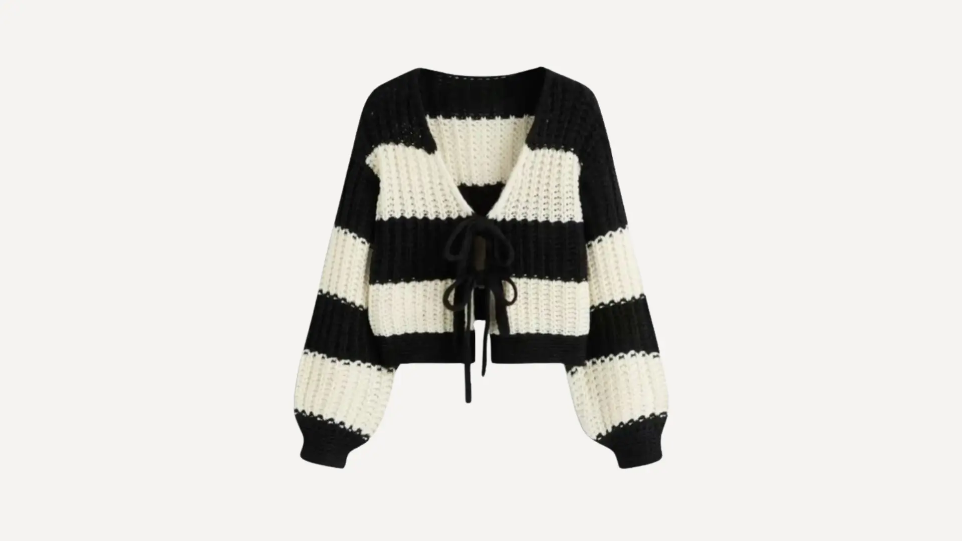 black and white striped knit cardigan top with a tie-front closure and long balloon sleeves on a white background