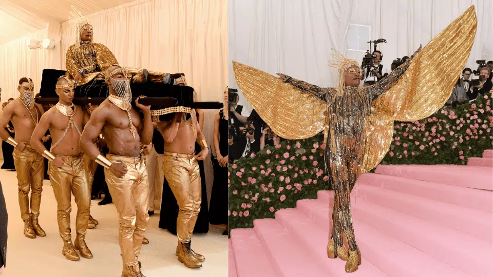 billy porter carried on a golden litter in custom gold winged catsuit by the blonds at the 2019 met gala camp notes on fashion theme