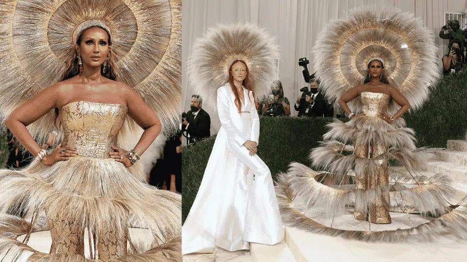 iman in hand painted feathers and towering sun god headpiece by harris reed x dolce and gabbana at the 2021 met gala in america theme