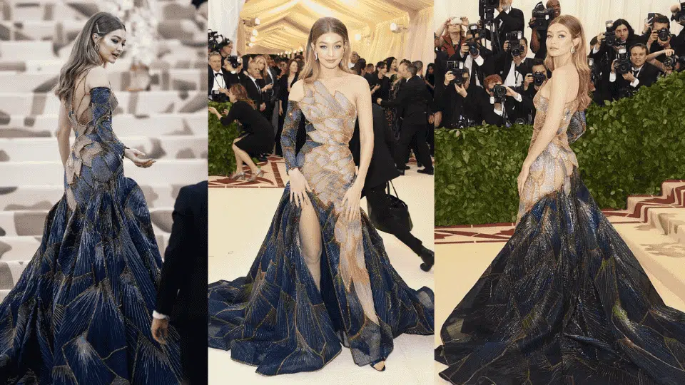 gigi hadid in iridescent stained glass inspired atelier versace gown at the 2018 met gala heavenly bodies fashion and the catholic imagination theme
