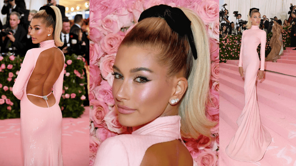 hailey bieber in pink sequin gown with bedazzled alexander wang logo thong at the 2019 met gala camp notes on fashion theme