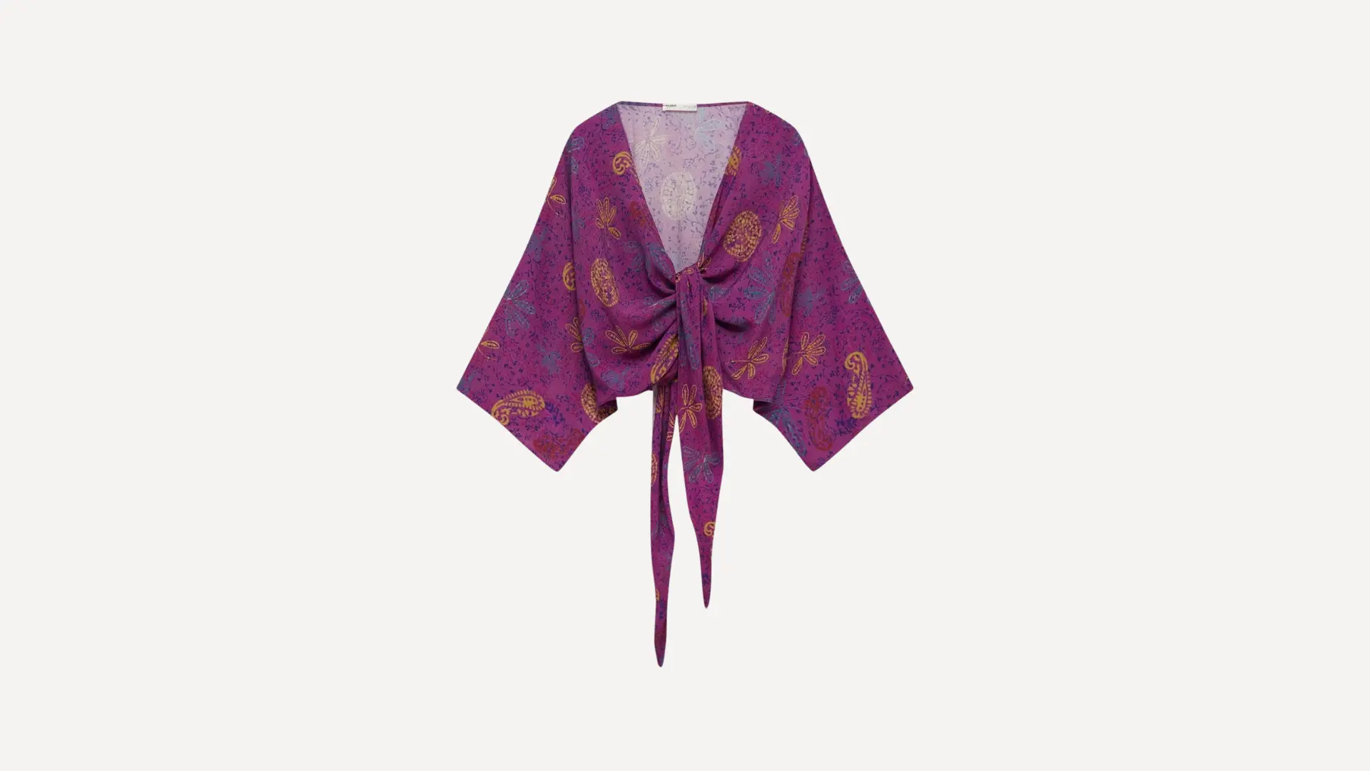 magenta boho _ bohemian top with wide sleeves and a front tie closure featuring yellow and orange paisley patterns