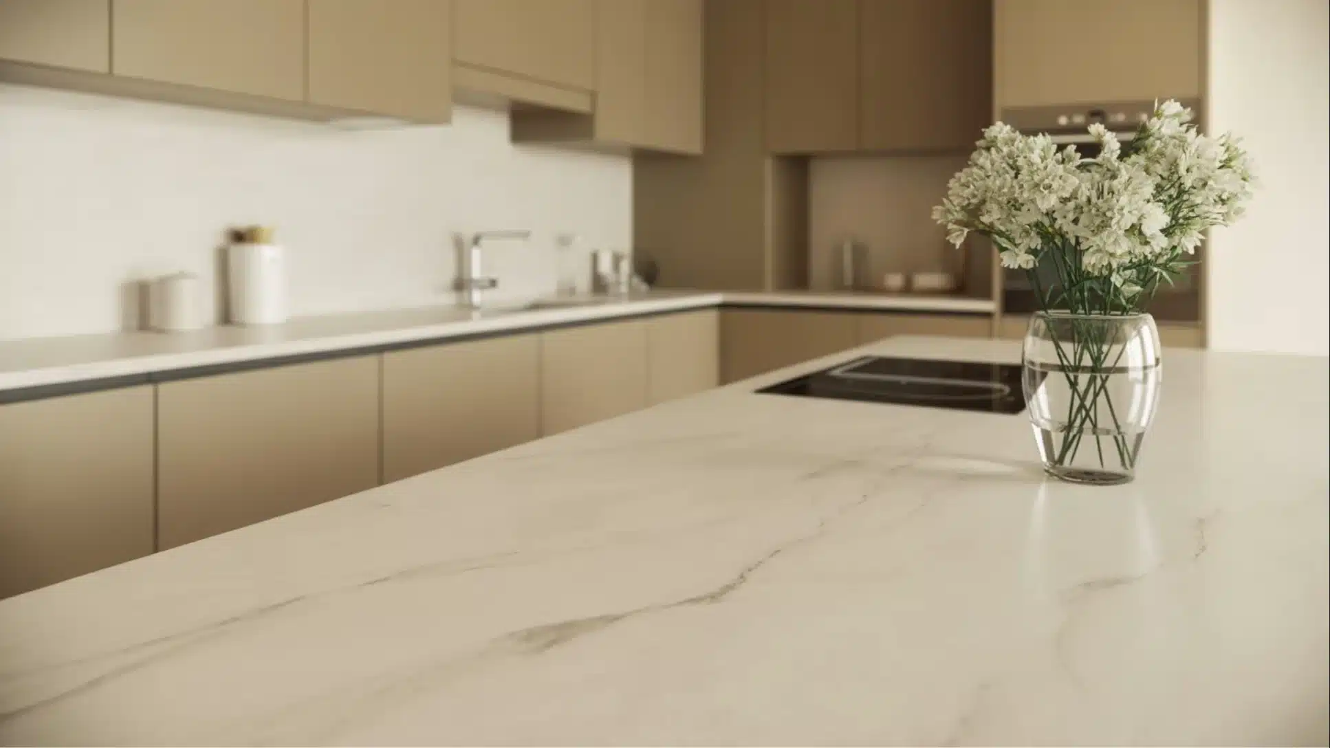 kitchen with beige cabinets, marble countertop island, built-in cooktop, minimalist decor, and a glass vase