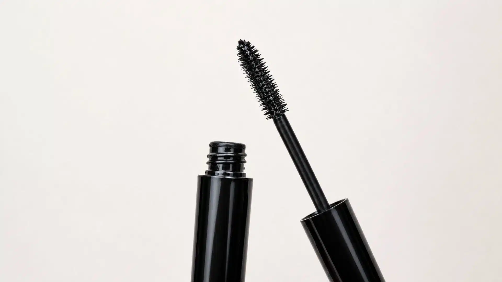black mascara tube with wand
