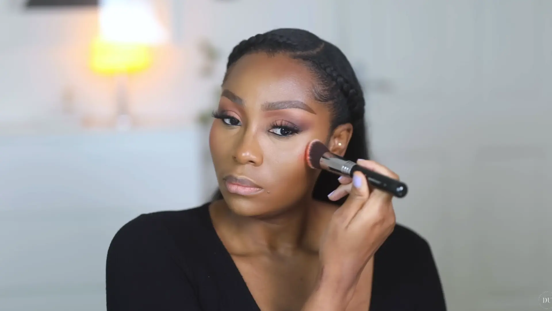 blush application in soft glam makeup looks using warm tones blended upward for natural flushed skin effect