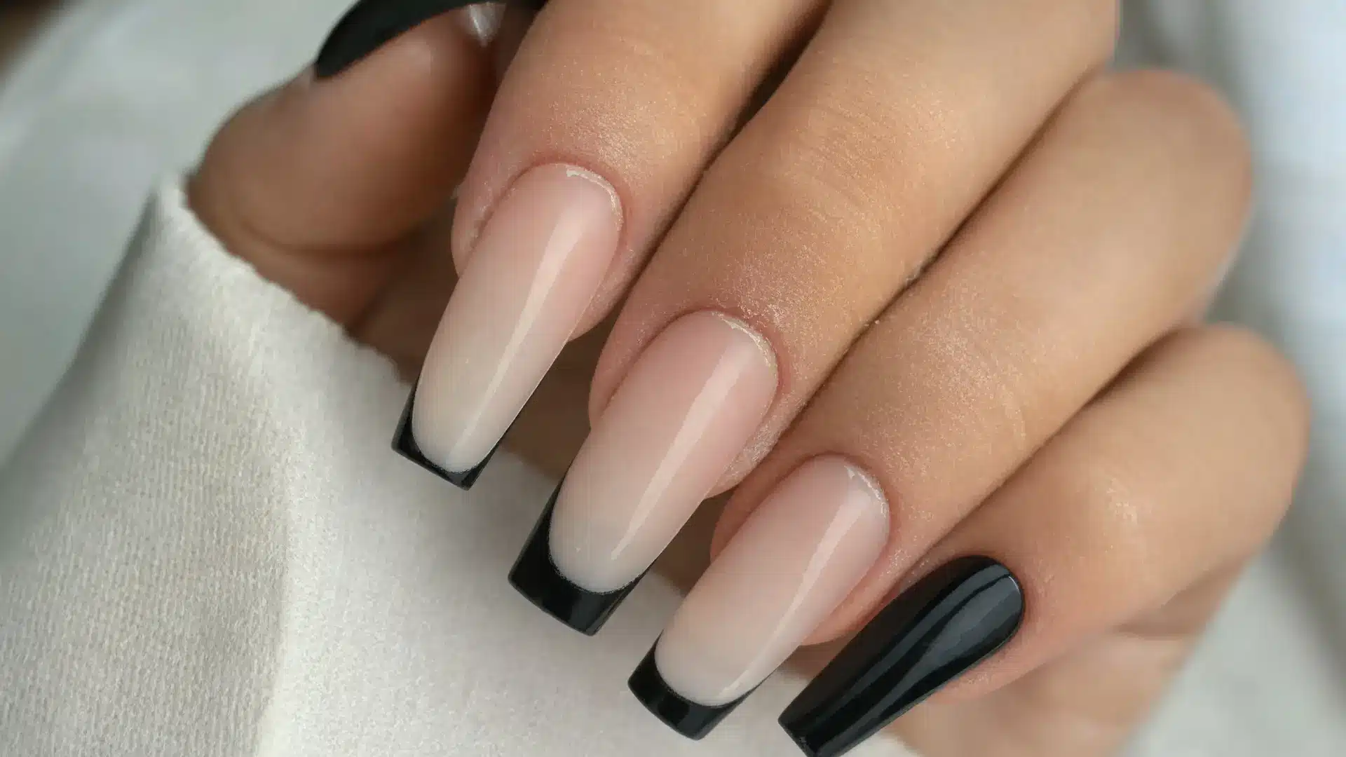 close up acrylic nail extensions long coffin and stiletto shapes strong glossy salon finish durable sculpted nails