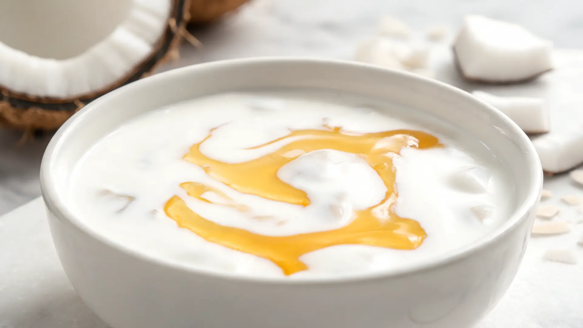 coconut milk honey mix creamy texture tropical background soft warm light