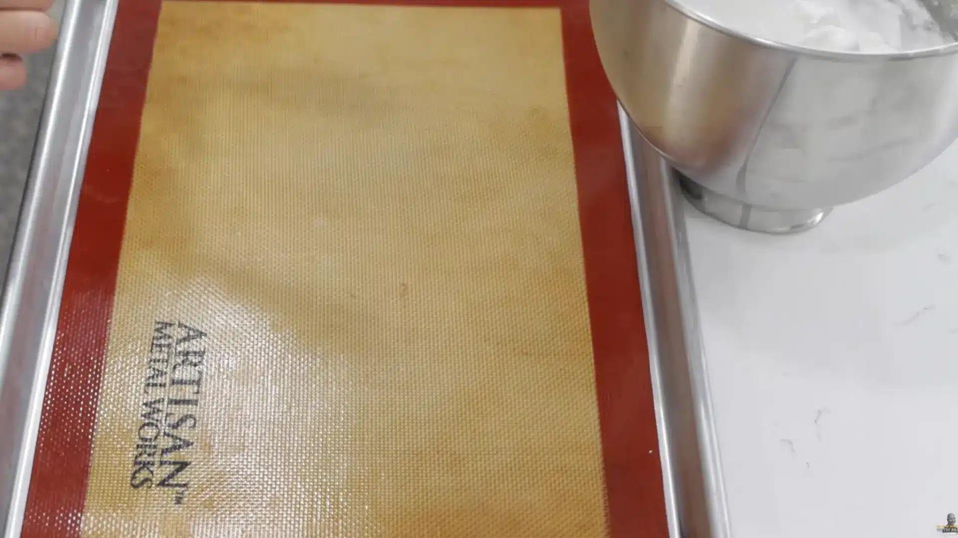 lining baking sheet with parchment paper or silicone mat for cloud bread preparation