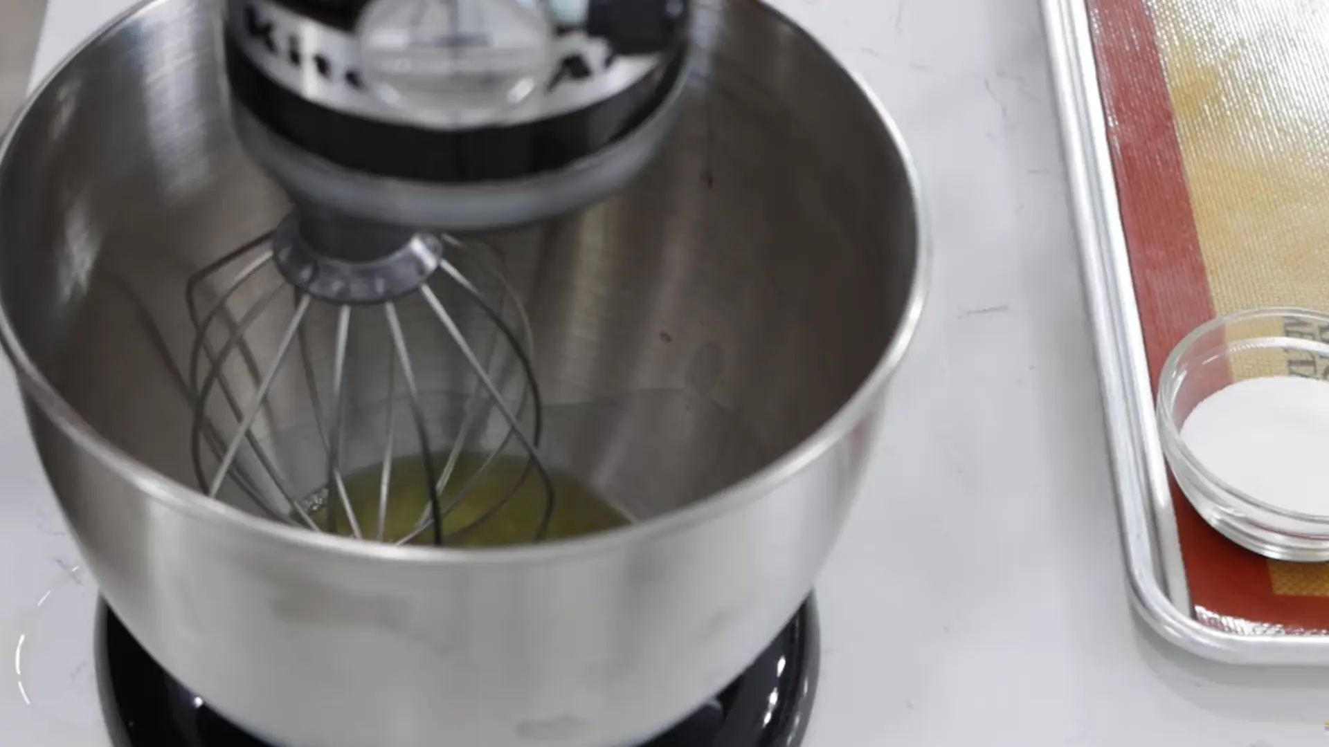 whipping egg whites in mixer until frothy and airy texture forms for cloud bread base